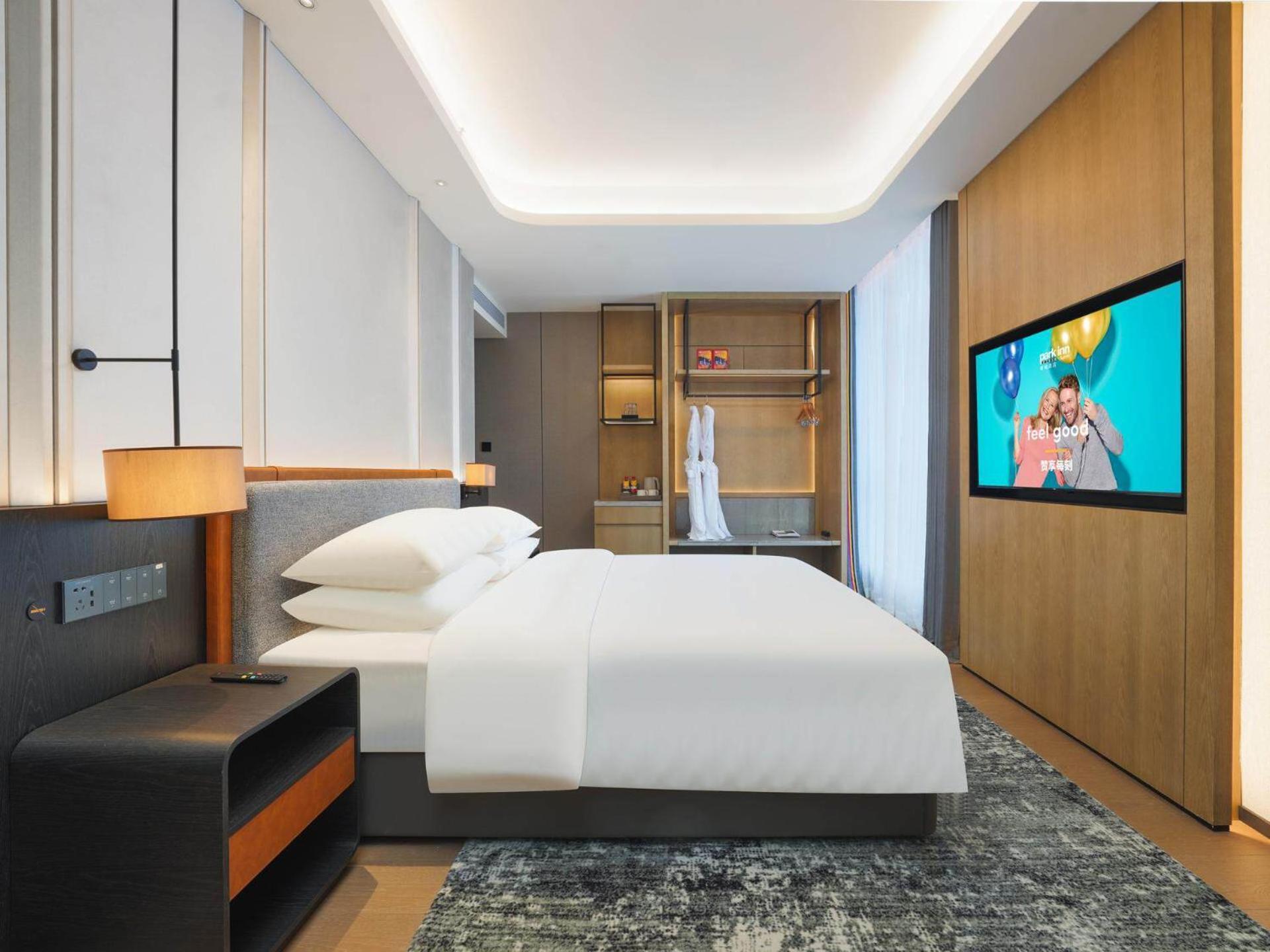 Park Inn By Radisson Nanchong Yilong Star City Plaza Extérieur photo