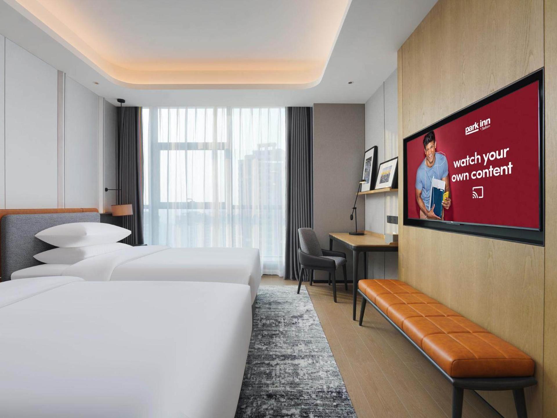 Park Inn By Radisson Nanchong Yilong Star City Plaza Extérieur photo